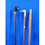 A WALKING STICK WITH CHINESE WHITE METAL TOP