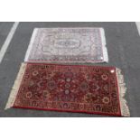 A SMALL MODERN PERSIAN RUG