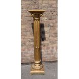 A GILTWOOD IONIC COLUMN STAND