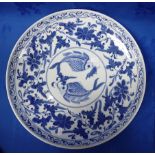 A LARGE CHINESE BLUE AND WHITE DISH