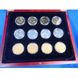 A 2011 QUEEN ELIZABETH II GOLDEN JUBILEE GOLD PLATED CROWN SET