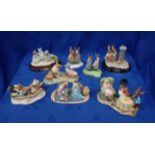 A COLLECTION OF ROYAL DOULTON AND BESWICK BEATRIX POTTER FIGURINES