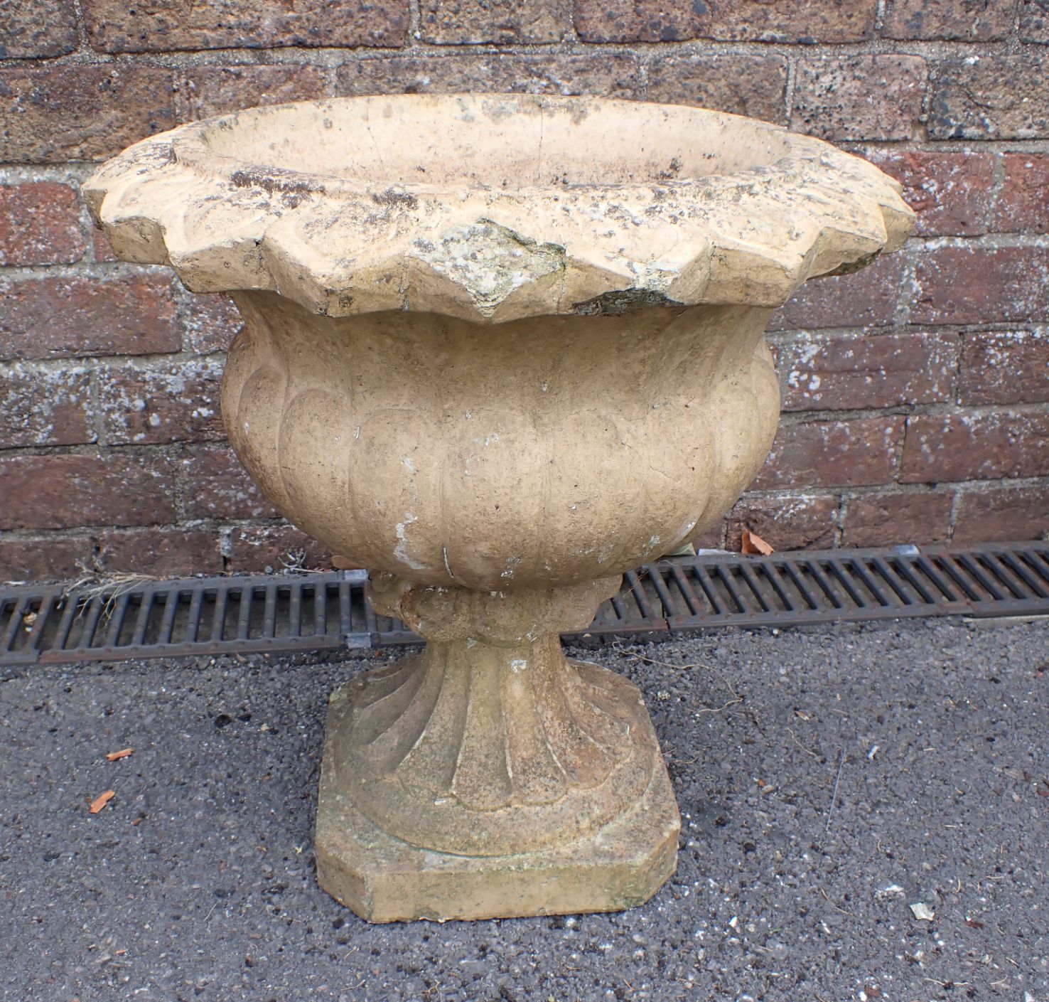 A BUFF TERRACOTTA GARDEN URN