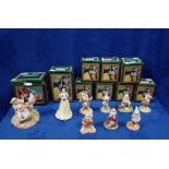 A COLLECTION OF ROYAL DOULTON 'SNOW WHITE AND THE SEVEN DWARFS' FIGURINES