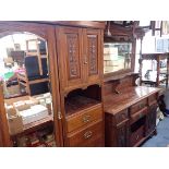 AN EDWARDIAN MIRROR-BACKED SIDEBOARD