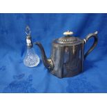 A SILVER MOUNTED CUT-GLASS PHIAL AND SILVER PLATED TEAPOT