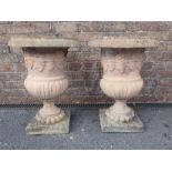 A PAIR OF NEOCLASSICAL STYLE GARDEN URNS
