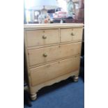 A VICTORIAN STRIPPED PINE CHEST OF DRAWERS