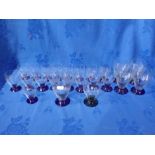 A SET OF CUT GLASSES WITH BLUE BASES (22)