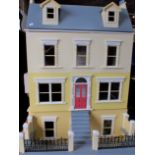 A DOLL'S HOUSE, IN THE STYLE OF A VICTORIAN VILLA