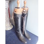 A PAIR OF VINTAGE LEATHER RIDING BOOTS