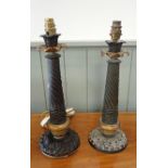 A PAIR OF 19TH CENTURY EMPIRE STYLE BRONZED AND GILT METAL LAMP BASES
