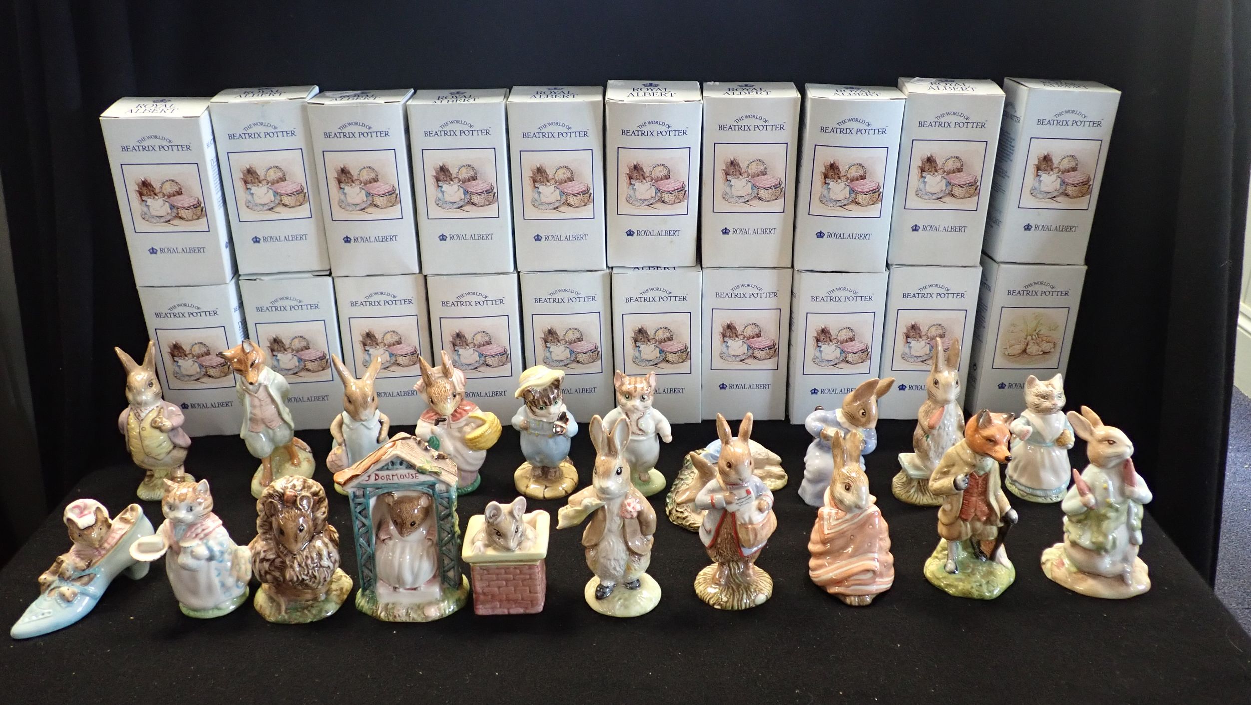 A COLLECTION OF ROYAL ALBERT AND BESWICK BEATRIX POTTER FIGURINES