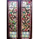 A PAIR OF VICTORIAN STAINED GLASS PANELS