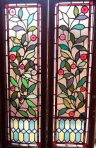 A PAIR OF VICTORIAN STAINED GLASS PANELS