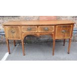 A MAHOGANY BOWFRONTED SIDEBOARD