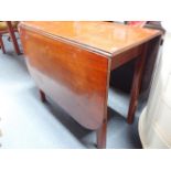 A MAHOGANY DROP-LEAF DINING TABLE