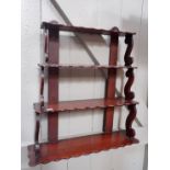 A VICTORIAN MAHOGANY WALL HANGING SHELF