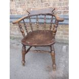 AN ELM AND BEECH 'SMOKERS BOW' CHAIR, WITH AIR MINISTRY STAMP