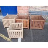 FOUR TEAK GARDEN PLANTERS