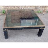 A MODERN COFFEE TABLE, WITH FIBRE OPTIC EFFECT BENEATH THE SMOKED GLASS TOP