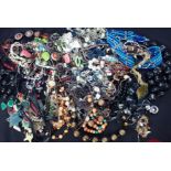 A QUANTITY OF COSTUME JEWELLERY