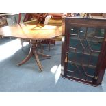 A GEORGE III GLAZED HANGING CORNER CABINET