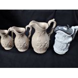 A SET OF THREE VICTORIAN MOULDED JUGS