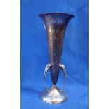 AN ARTS AND CRAFTS PLANISHED TRUMPET VASE