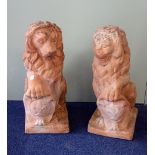 PAIR OF 19th CENTURY STYLE TERRACOTTA LIONS