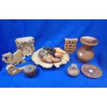 A CARVED WOODEN BOWL WITH A COLLECTION OF CARVED FRUIT