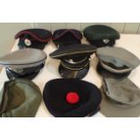 A COLLECTION MILITARY HATS AND CAPS