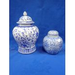 A BLUE AND WHITE CHINESE VASE AND COVER