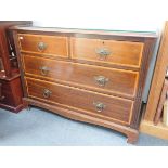 AN EDWARDIAN MAHOGANY CHEST OF DRAWERS