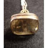 AN EARLY 20TH CENTURY CITRINE AND GOLD FOB