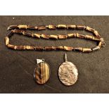 A TIGER'S EYE NECKLACE