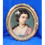 A 19TH CENTURY REVERSE PAINTING OF A YOUNG WOMAN