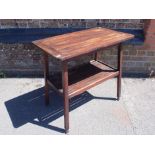 A TEAK GARDEN TABLE MADE FROM H.M.S 'WEYMOUTH'