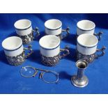 SIX SILVER ROCOCO STYLE DEMITASSE HOLDERS