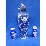 A BLUE AND AND WHITE CHINESE VASE AND COVER