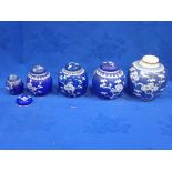 A COLLECTION OF CHINESE BLUE AND WHITE GINGER JARS
