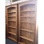 A PAIR OF PINE OPEN BOOKCASES