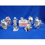 A COLLECTION OF NAO (LLADRO) FIGURINES