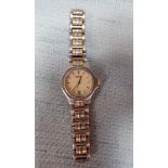 A LADIES STAINLESS STEEL BRACELET WATCH