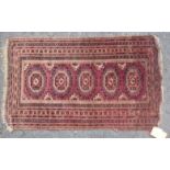 AN ANTIQUE TEKKE TURKMEN RUG