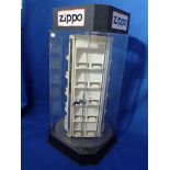 A VINTAGE ZIPPO LIGHTER SHOP DISPLAY CASE (REVOLVING)