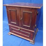 A SMALL MAHOGANY TABLE CABINET