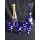 A BLUE DECANTER AND SIX GLASSES