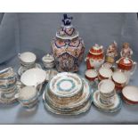 A CROWN STAFFORDSHIRE TEA SET, TWO CERAMIC FIGURES AND A 'DELFT' VASE OF HEXAGONAL FORM