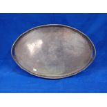 A SILVER-PLATED GALLERIED OVAL TRAY